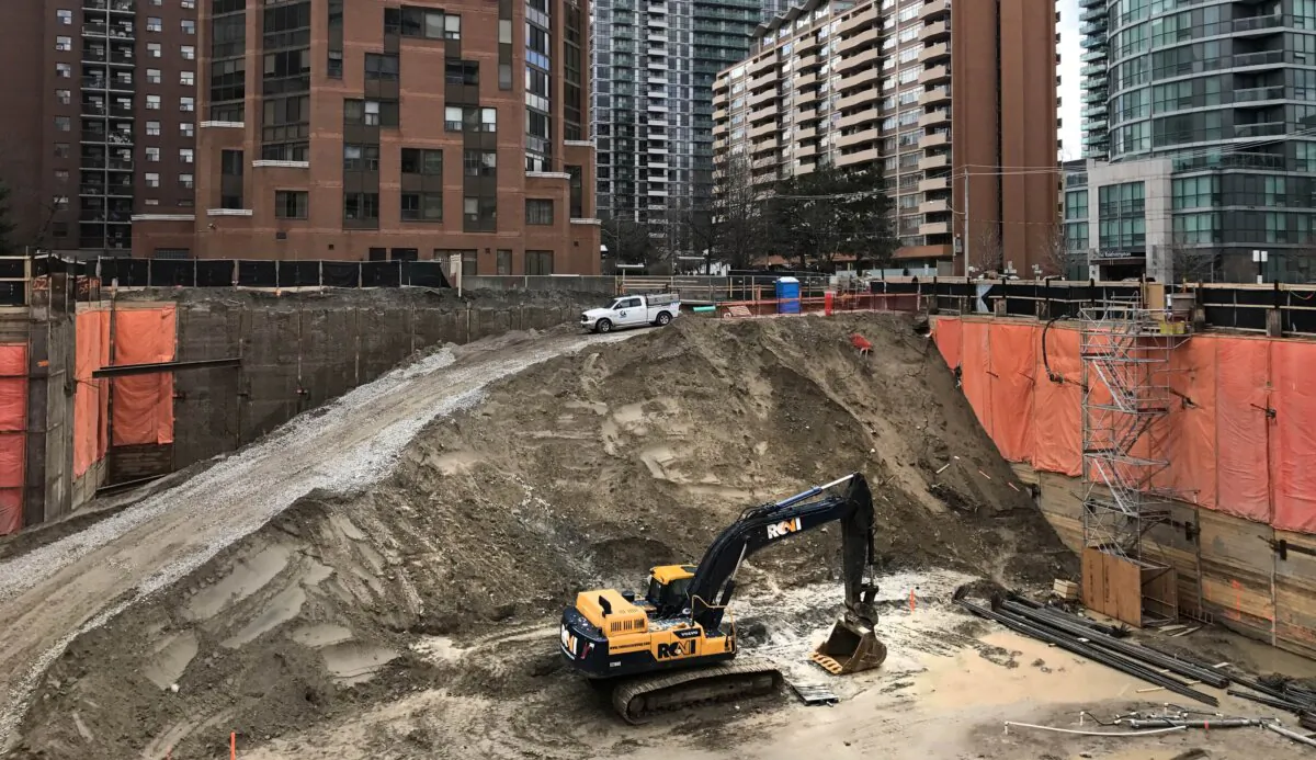 Construction equipment is parked at the bottom of a pit on the site of a new condominium complex off Redpath Avenue in Toronto, Ont., on April 1, 2017. (Chris Helgren/Reuters)