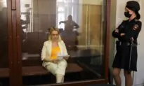 Former Russian State TV Journalist Gets 8 1/2-Year Sentence in Absentia for Ukraine War Criticism
