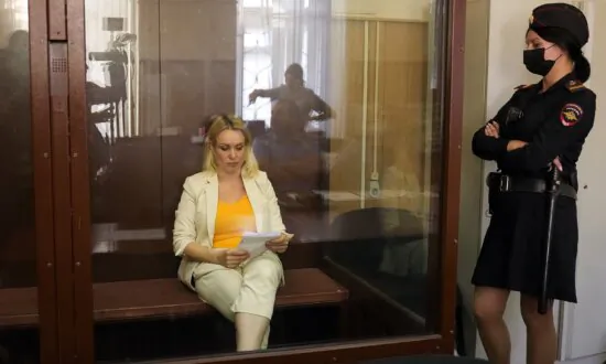 Former Russian State TV Journalist Gets 8 1/2-Year Sentence in Absentia for Ukraine War Criticism
