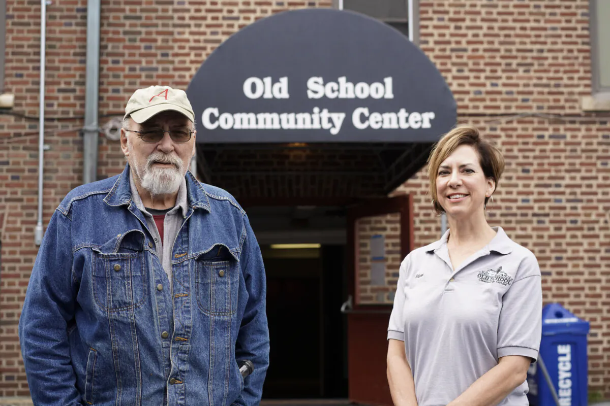 Bob Clouse and Alison Miller in front of the future Old School Community Center in Otisville, N.Y., on Oct. 4, 2023. (Cara Ding/The Epoch Times)