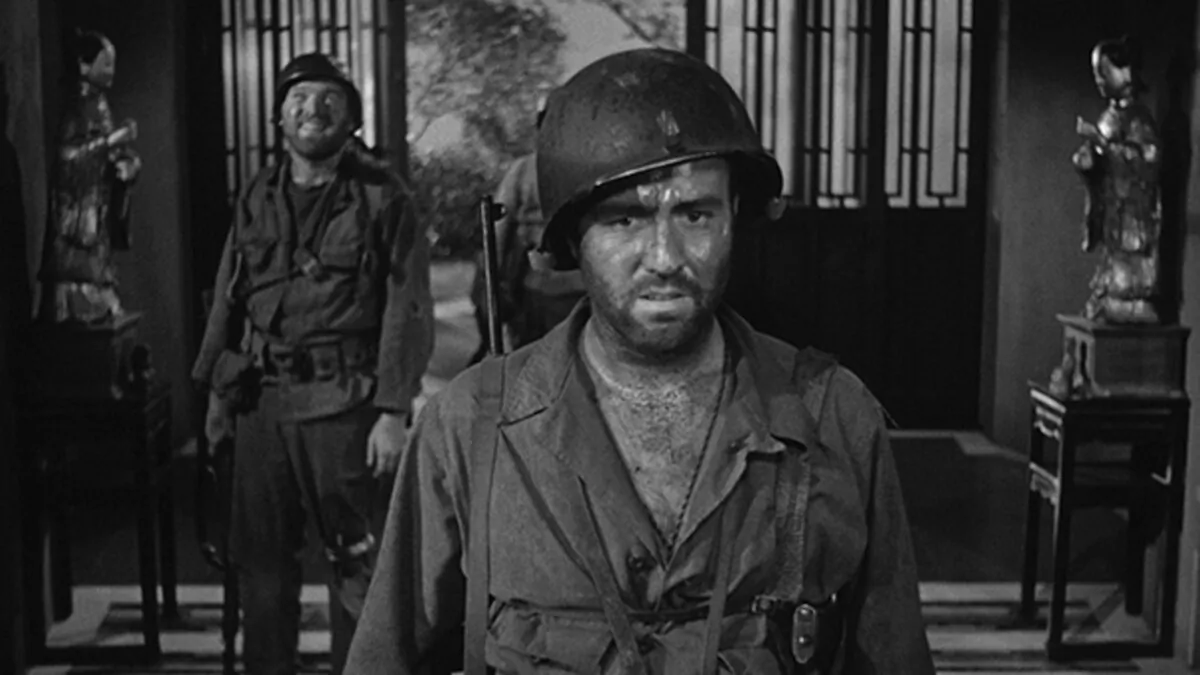 Lt. Driscoll (Steve Brodie, L) and Sgt. Zack (Gene Evans), in “Steel Helmet.” (Lippert Pictures)