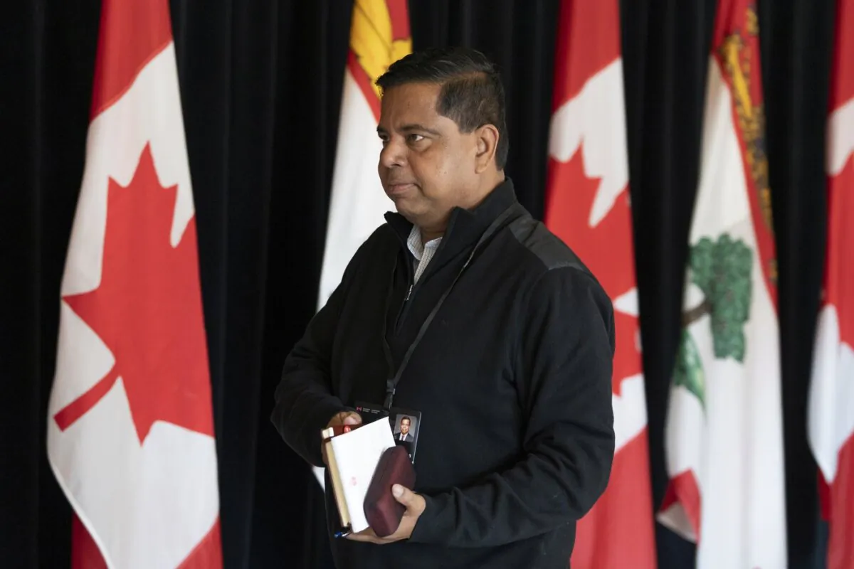 Minister of Crown-Indigenous Relations Gary Anandasangaree walks past members of the media during the Liberal Cabinet retreat in Charlottetown, on Aug. 22, 2023. (The Canadian Press/Darren Calabrese)