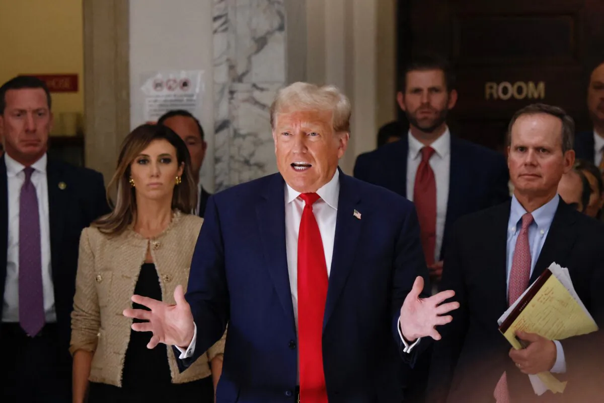 Former President Donald Trump speaks to the media during the third day of his civil fraud trial in New York on Oct.4, 2023. (Kena Betancur/AFP via Getty Images)
