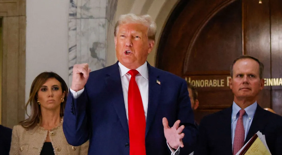 Former President Donald Trump speaks to the media during the third day of his civil fraud trial in New York on Oct. 4, 2023. (Kena BetancurAFP via Getty Images)