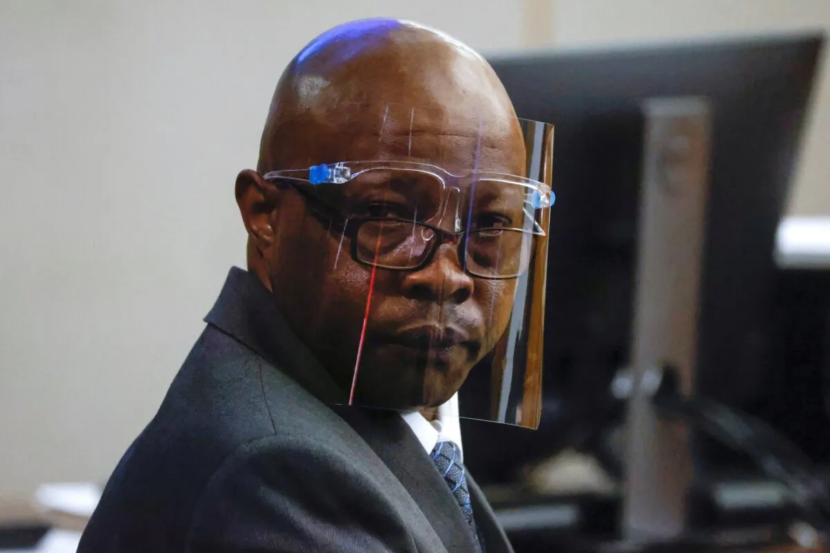 Accused serial killer Billy Chemirmir looks back ahead of his third trial at Frank Crowley Courts Building in Dallas on Oct. 3, 2022. (Shafkat Anowar/Pool/The Dallas Morning News via AP)