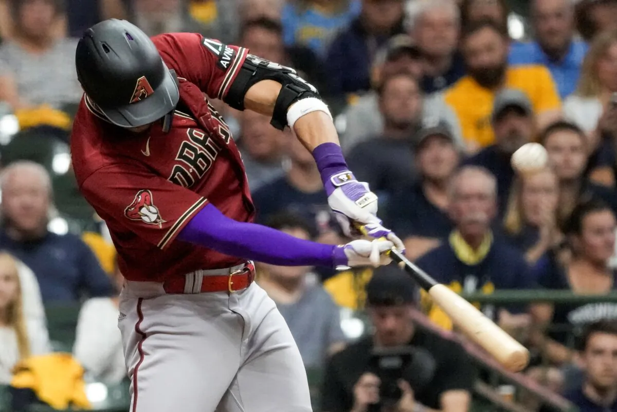 Arizona Diamondbacks' Lourdes Gurriel Jr. hits an RBI single during the sixth inning of a Game 2 of their National League wildcard baseball series against the Milwaukee Brewers in Milwaukee on Oct. 4, 2023. (Morry Gash/AP Photo)