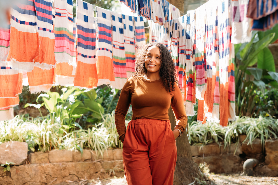 Hana Getachew In Ethiopia with colorful fabrics