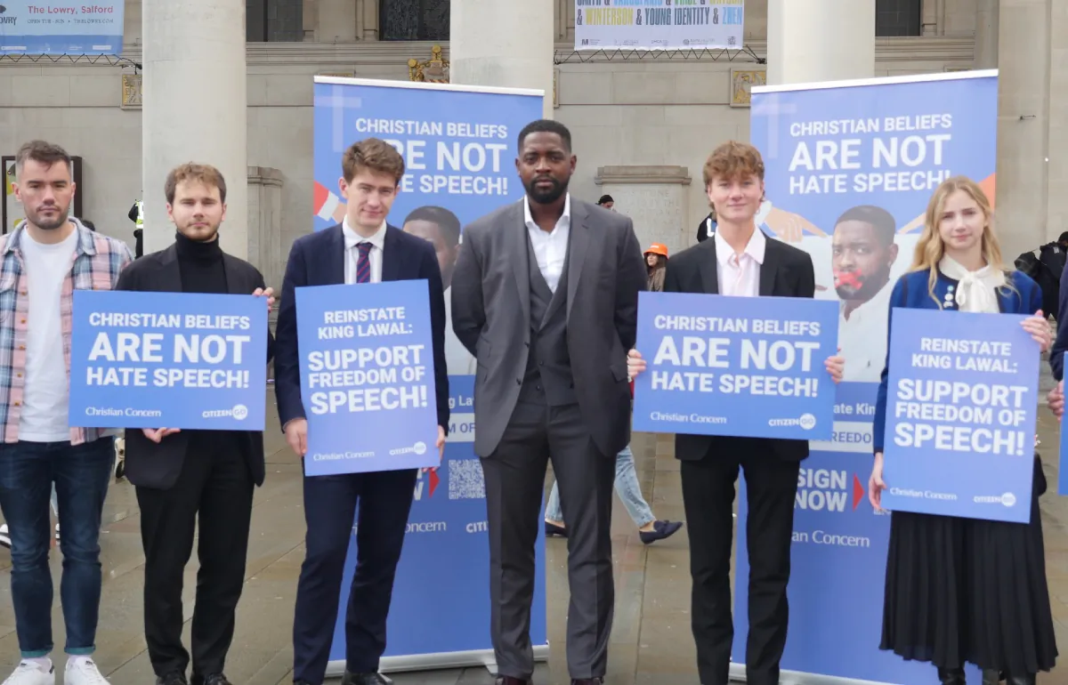 Suspended Tory councillor King Lawal (C) with supporters protesting outside the Conservative Party Conference in Manchester on Oct. 4, 2023. (Courtesy of Christian Concern)