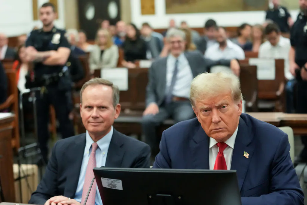 Former President Donald Trump appears in the courtroom, with attorney Christopher M. Kise, for the third day of his civil fraud trial at New York State Supreme Court, on Oct. 4, 2023. (Mary Altafeer / Pool/Getty Images)