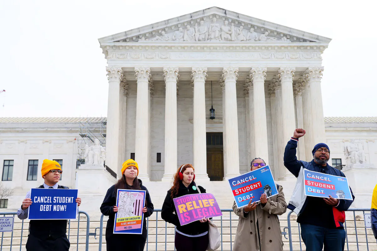 People participate in a rally over cancelling student debt outside the U.S. Supreme Court in Washington on Feb. 28, 2023. (Jemal Countess/Getty Images for People's Rally to Cancel Student Debt)