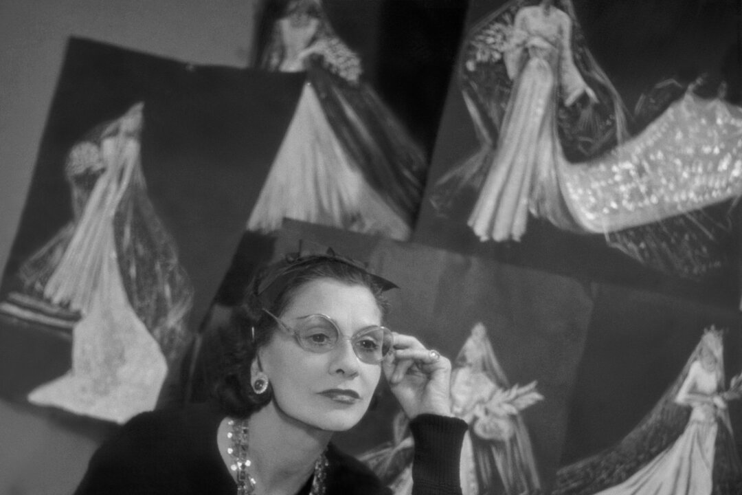 Gabrielle “Coco” Chanel in her couture house at 31 rue Cambon, Paris, in 1937. She moved here in 1918, bringing her Haute Couture ateliers, apartment, and creation studio all under one roof. (Roger Schall/Condé Nast/Shutterstock)