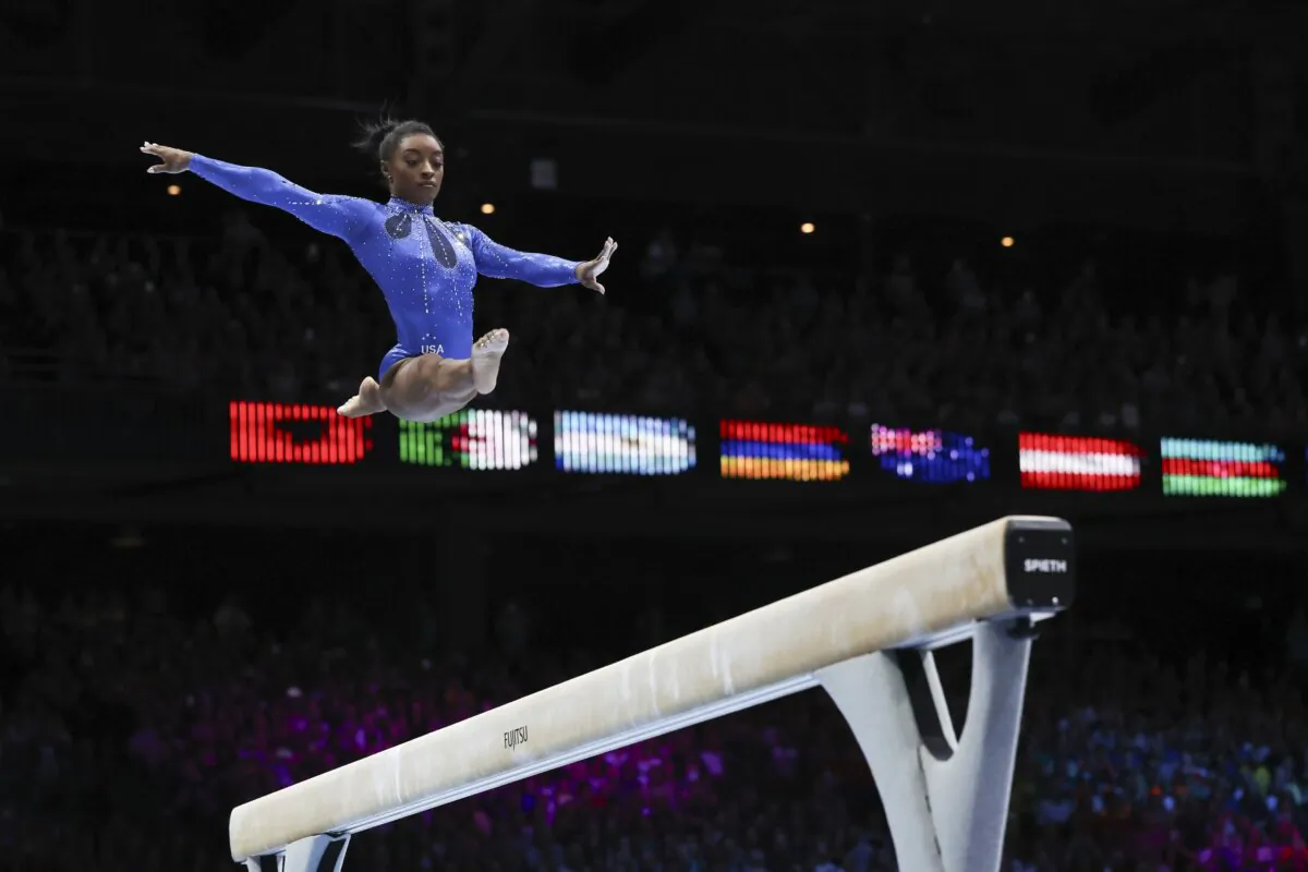 Simone Biles of the United States competes on the beam during the women's all-round final at the Artistic Gymnastics World Championships in Antwerp, Belgium, on Oct. 6, 2023. (Geert vanden Wijngaert/AP Photo)