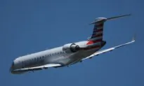 A Taxiing Airplane Collides With a Chicago Airport Shuttle, Injuring 2 People