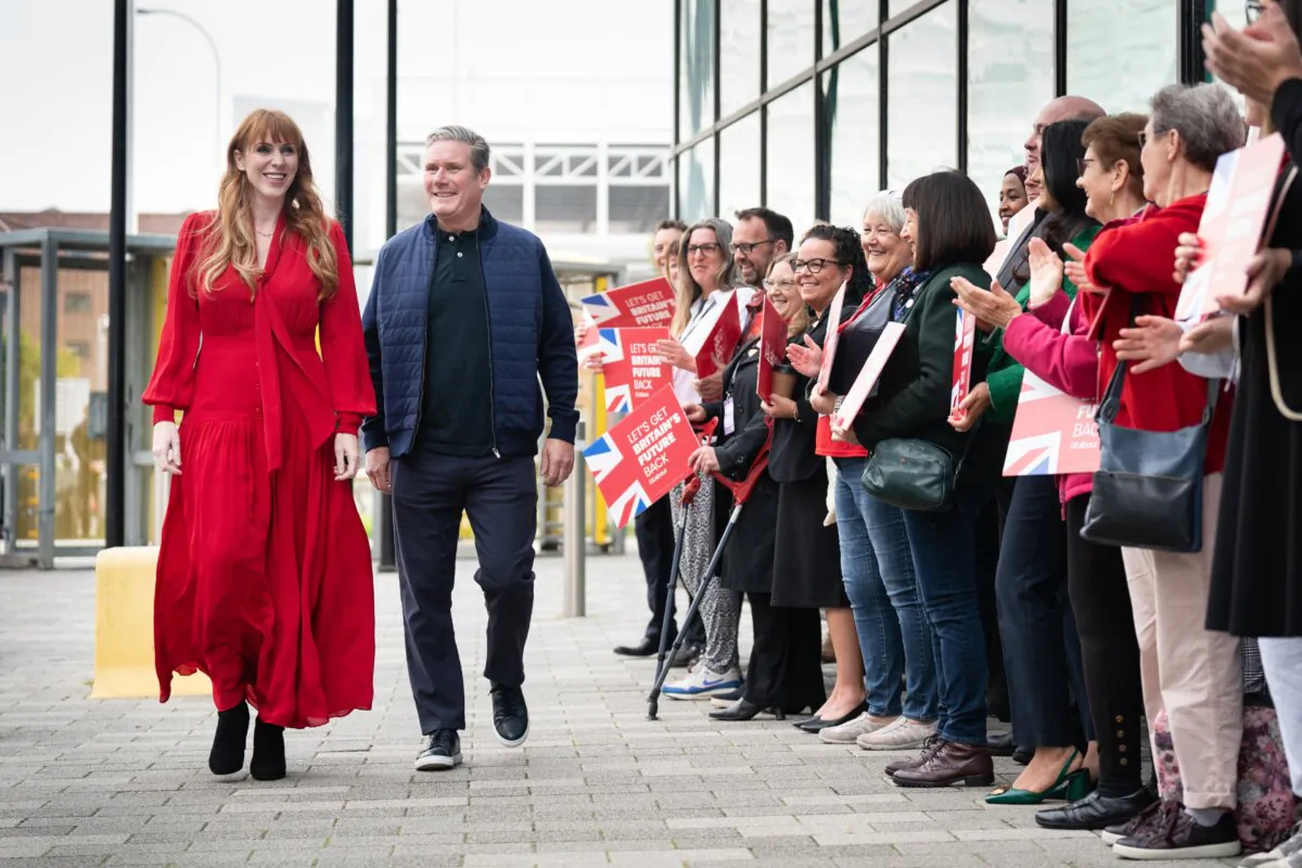 Labour Party Party leader Sir Keir Starmer and deputy leader Angela Rayner arrive at the Labour Party Conference in Liverpool, England, on Oct. 7, 2023. (Stefan Rousseau/PA)