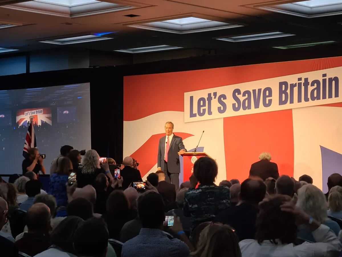 Nigel Farage speaks at the Reform UK conference, in the Hilton Metropole hotel in London, on Oct. 7, 2023. (Joseph Robertson/The Epoch Times)