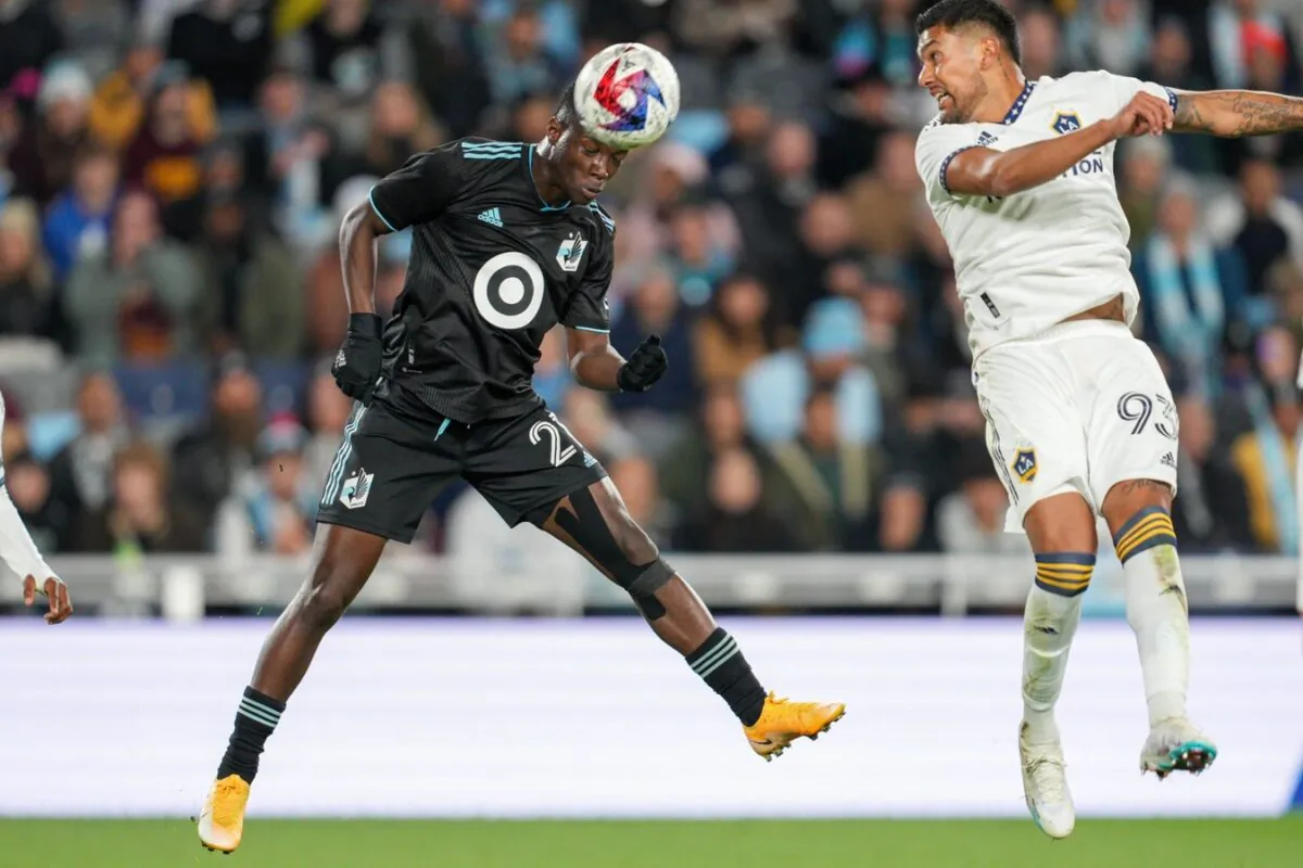 Minnesota United forward Bongokuhle Hlongwane (21) heads the ball against Los Angeles Galaxy defender Tony Alfaro (93) in the first half at Allianz Field in Saint Paul, Minn., on Oct. 7, 2023. (Matt Blewett/USA TODAY Sports via Field Level Media)
