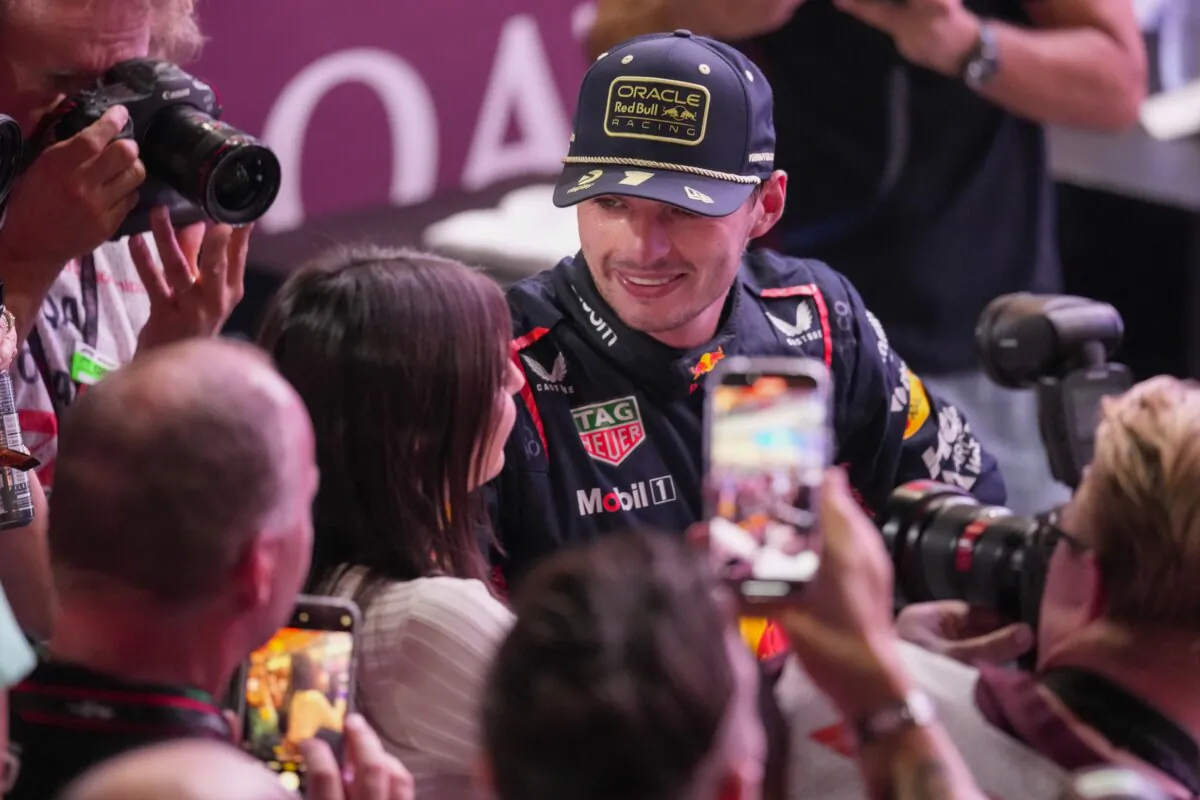 Red Bull driver Max Verstappen of the Netherlands reacts as he became F1 drivers world champion after the sprint race ahead of the Qatar Formula One Grand Prix at the Lusail International Circuit in Lusail, Qatar, on Oct. 7, 2023. (Darko Bandic/AP Photo)
