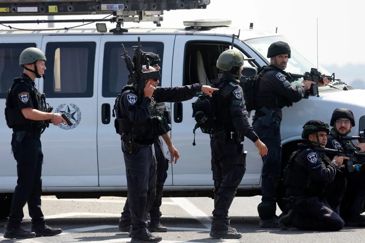 Israeli security forces take part in a search operation for Hamas operatives near Ashkelon, Israel, on Oct. 8, 2023. (Menahem Kahana/AFP via Getty Images)