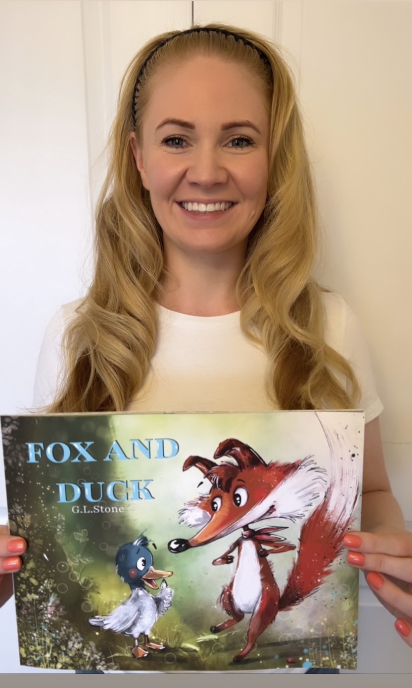 Ms. Stone with her latest book, 'Fox and Duck.'