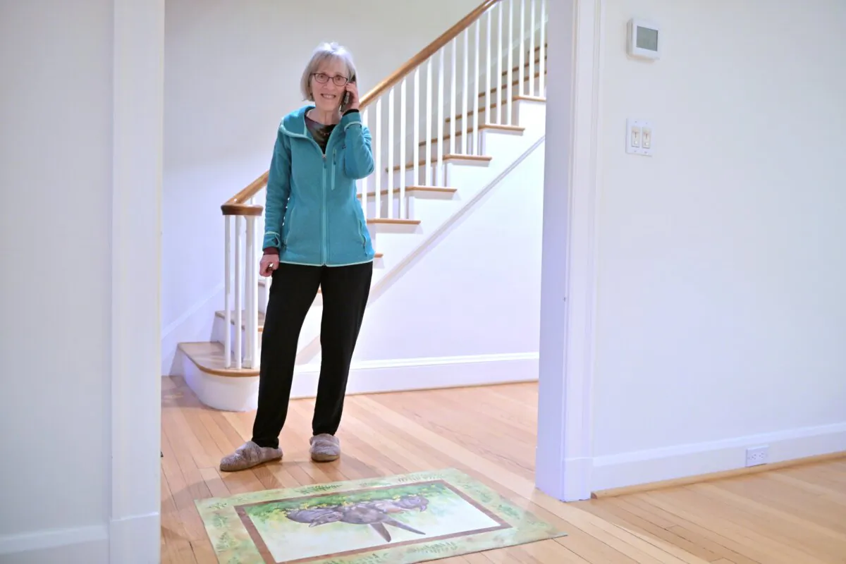 Claudia Goldin speaks to a reporter on the phone in her home in Cambridge, Mass., after learning that she received the Nobel Prize in Economics on Oct. 9, 2023. (Josh Reynolds/AP Photo)