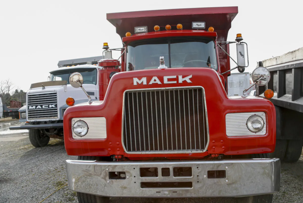 Mack trucks parked on a lot in Evans City, Pa., on Jan. 9, 2020. (AP Photo/Keith Srakocic)