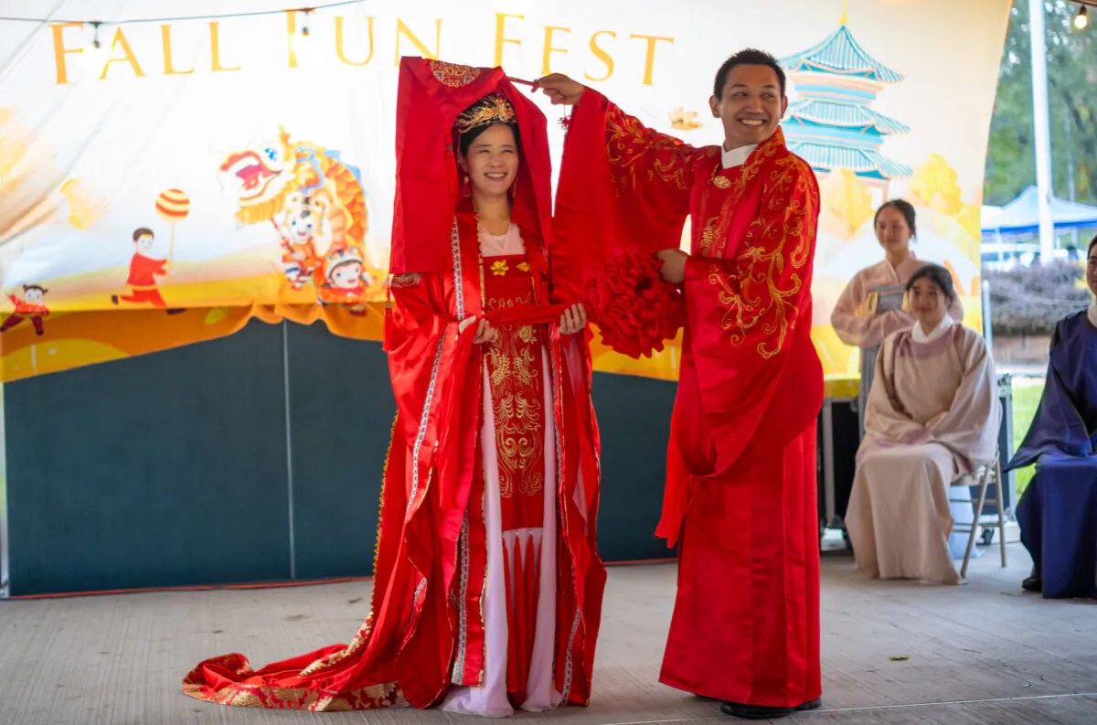 A traditional Chinese wedding is acted out at the Fall Fun Festival in Otisville, N.Y., on Oct. 7, 2023. (Mark Zou/The Epoch Times)