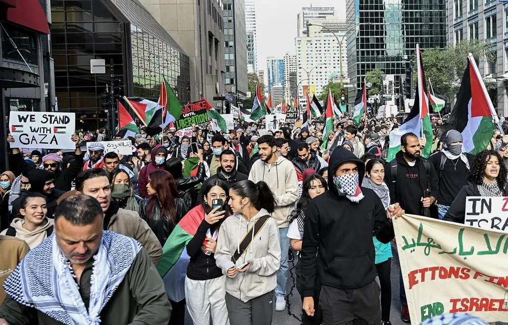 People take part in a protest for Palestine in Montreal on Oct. 8, 2023. (The Canadian Press/Graham Hughes)