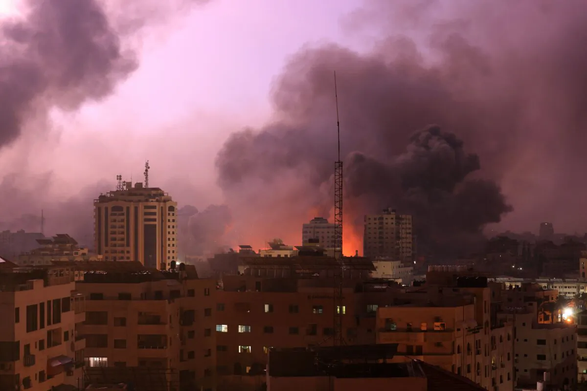 A fireball erupts during Israeli bombardment of Gaza City on Oct. 9, 2023. (Mahmud Hams/AFP via Getty Images)
