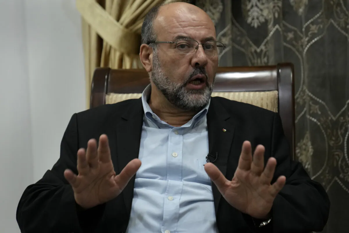 Ali Barakeh, a member of Hamas’s exiled leadership, speaks in an interview with The Associated Press in Beirut, Lebanon, on Oct. 9, 2023. (Hussein Malla/AP Photo)