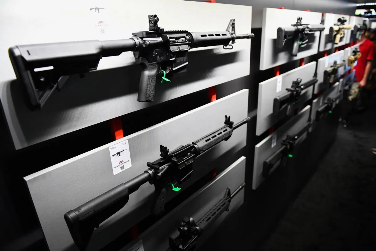 A Springfield Armory SAINT M-LoK AR-15 semi-automatic rifle is displayed on a presentation wall during the National Rifle Association annual meeting at the George R. Brown Convention Center in Houston on May 28, 2022. (Patrick T. Fallon/AFP via Getty Images)