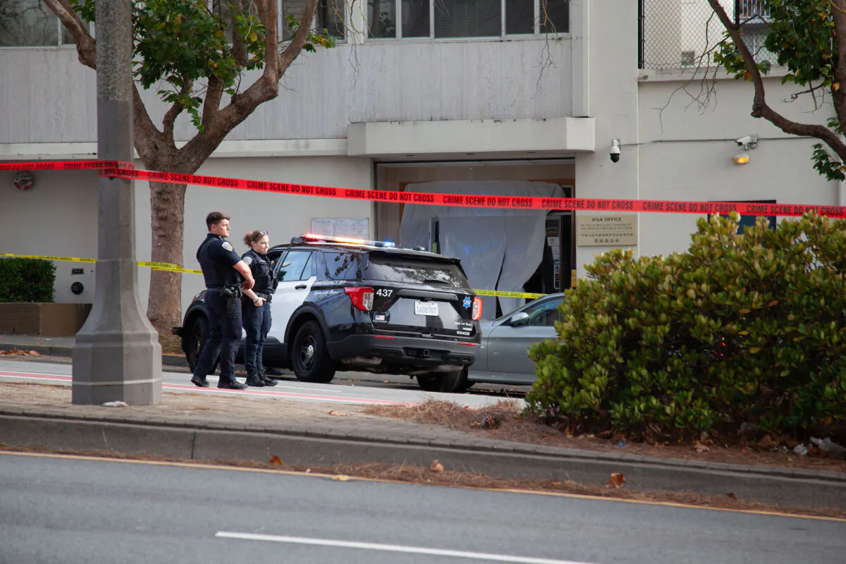 Police are on the scene after a vehicle crashed into the Chinese consulate building in San Francisco, on Oct. 9, 2023. (NTD/Lear Zhou)