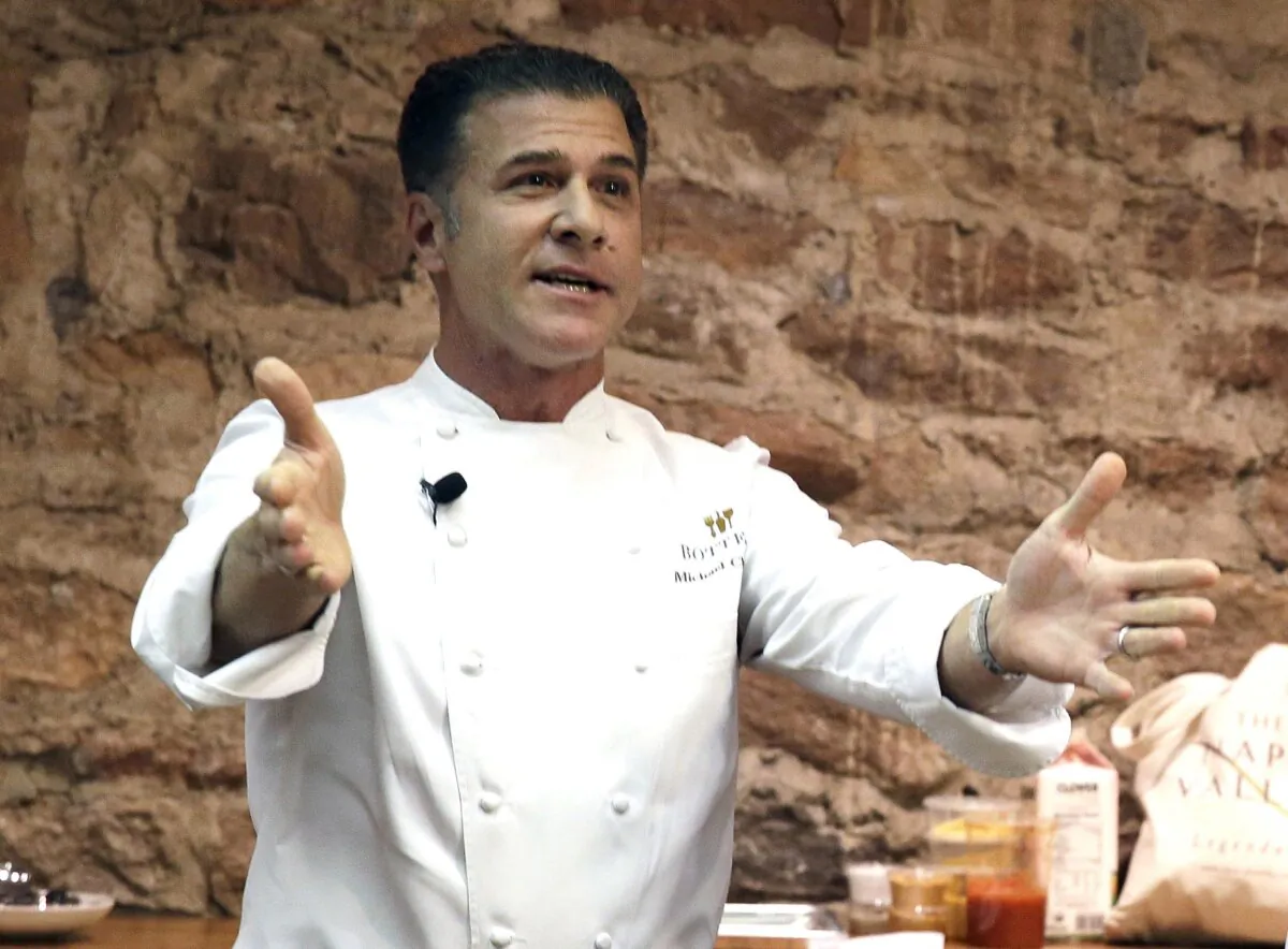 Chef Michael Chiarello appears before the start of an East meets West cooking battle in St. Helena, Calif., on Nov. 23, 2013. (Eric Risberg/AP Photo)