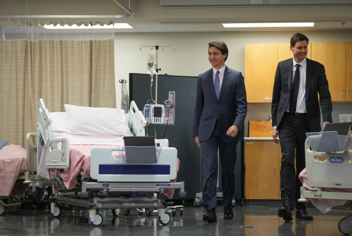 Prime Minister Justin Trudeau, left, and B.C. Premier David Eby arrive for a healthcare funding announcement at Kwantlen Polytechnic University, in Langley, B.C., on Mar. 1, 2023. (The Canadian Press/Darryl Dyck)