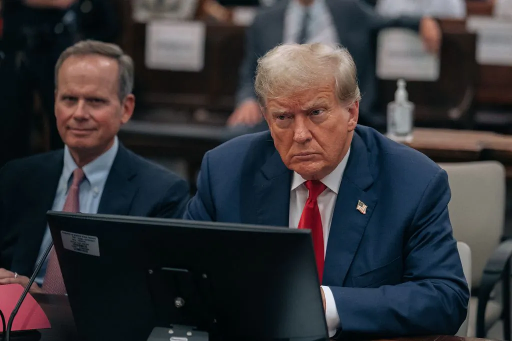 Former President Donald Trump sits inside the courtroom for the third day of his civil fraud trial in New York on Oct. 4, 2023. (Jeenah Moon/Pool/AFP via Getty Images)