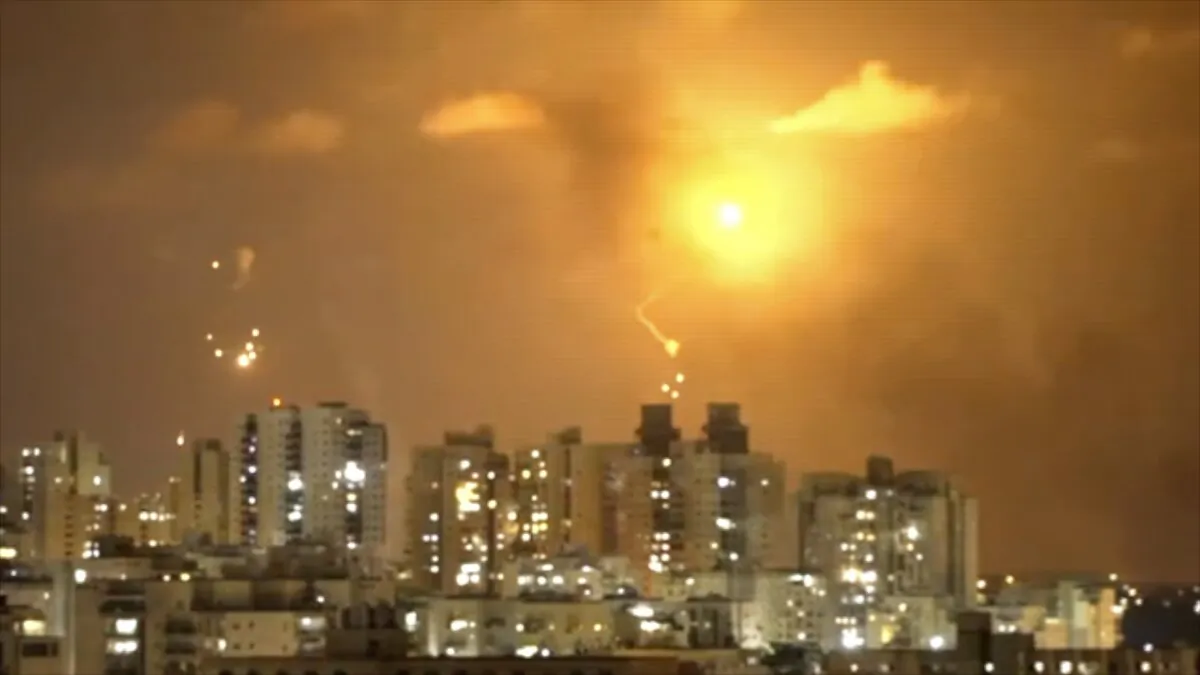 Rockets explode in the night sky of Ashkelon, Israel, on Oct. 10, 2023. (CNN/Screenshot via NTD)