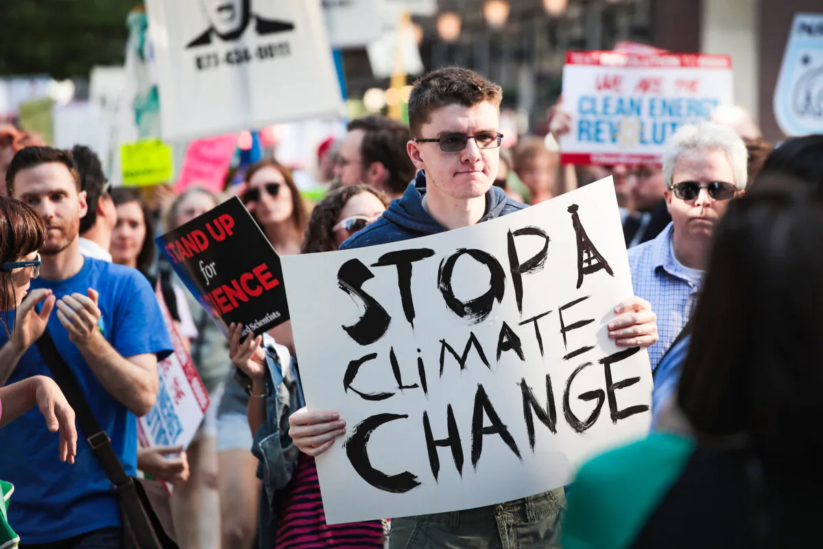 Demonstrators protest President Donald Trump's decision to exit the Paris climate change accord in Chicago on June 2, 2017. (Scott Olson/Getty Images)