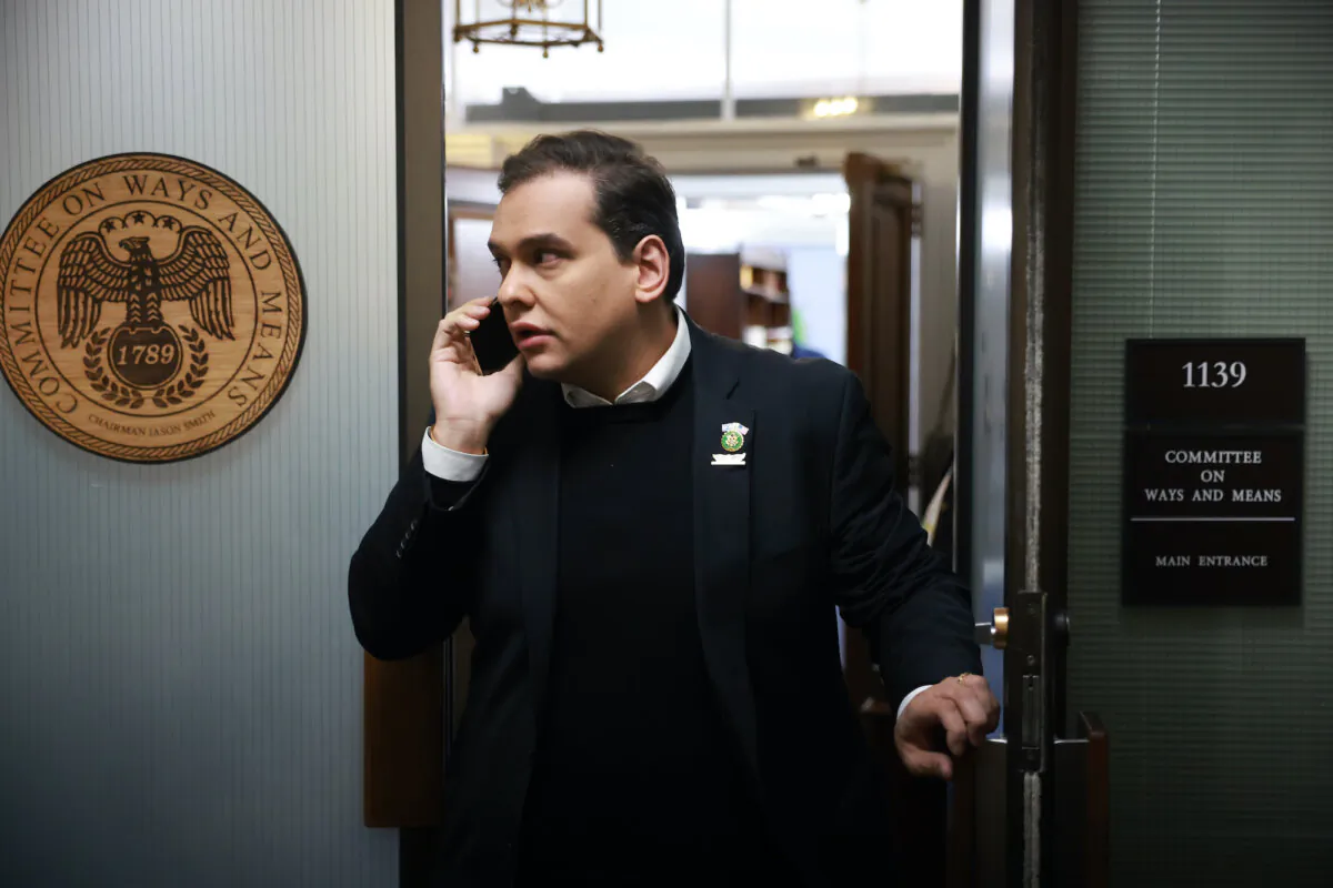 Rep. George Santos (R-N.Y.) leaves a candidate forum with House Republicans to hear from members running for U.S. Speaker of House in the Longworth House Office Building in Washington on Oct. 10, 2023. (Joe Raedle/Getty Images)
