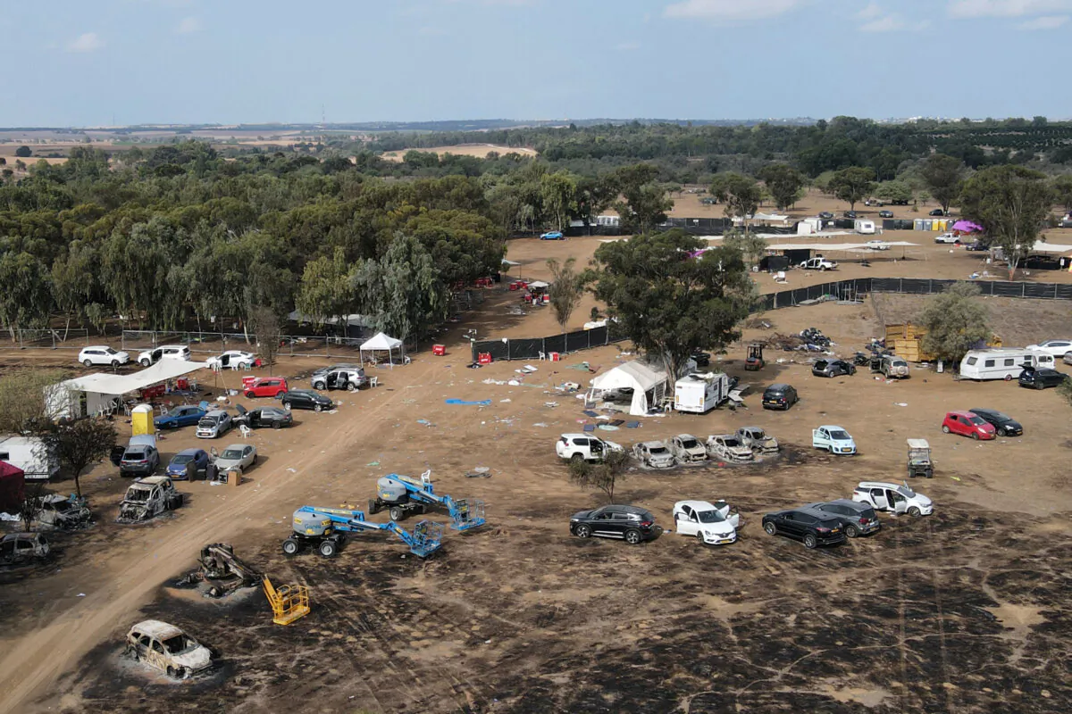 An aerial picture shows the abandoned site of the attack on the Supernova desert music festival by Hamas terrorists near Kibbutz Reim, in the Negev desert in southern Israel, on Oct. 10, 2023. Hamas gunmen killed around 270 revellers who were attending an outdoor rave music festival in an Israeli community near Gaza at the weekend, a volunteer who helped collect the bodies said on Oct. 9. (Jack Guez/AFP via Getty Images)