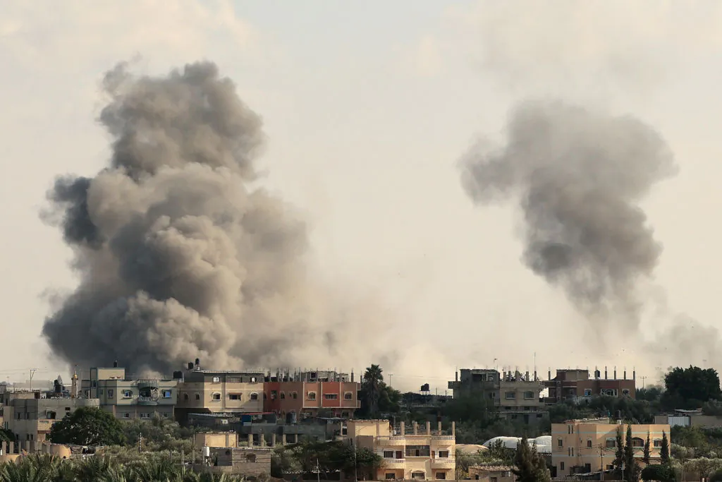 Smoke billows from the Gaza's Rafah border crossing with Egypt during an Israeli airstrike on Oct. 10, 2023. (Said Khatib/AFP via Getty Images)