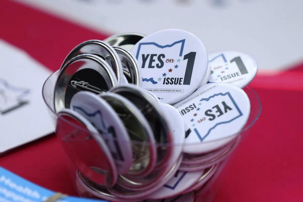Buttons in support of Issue 1, the Right to Reproductive Freedom amendment, sit on display at a rally held by Ohioans United for Reproductive Rights at the Ohio Statehouse in Columbus, Ohio, on Oct. 8, 2023. (Joe Maiorana/AP Photo)