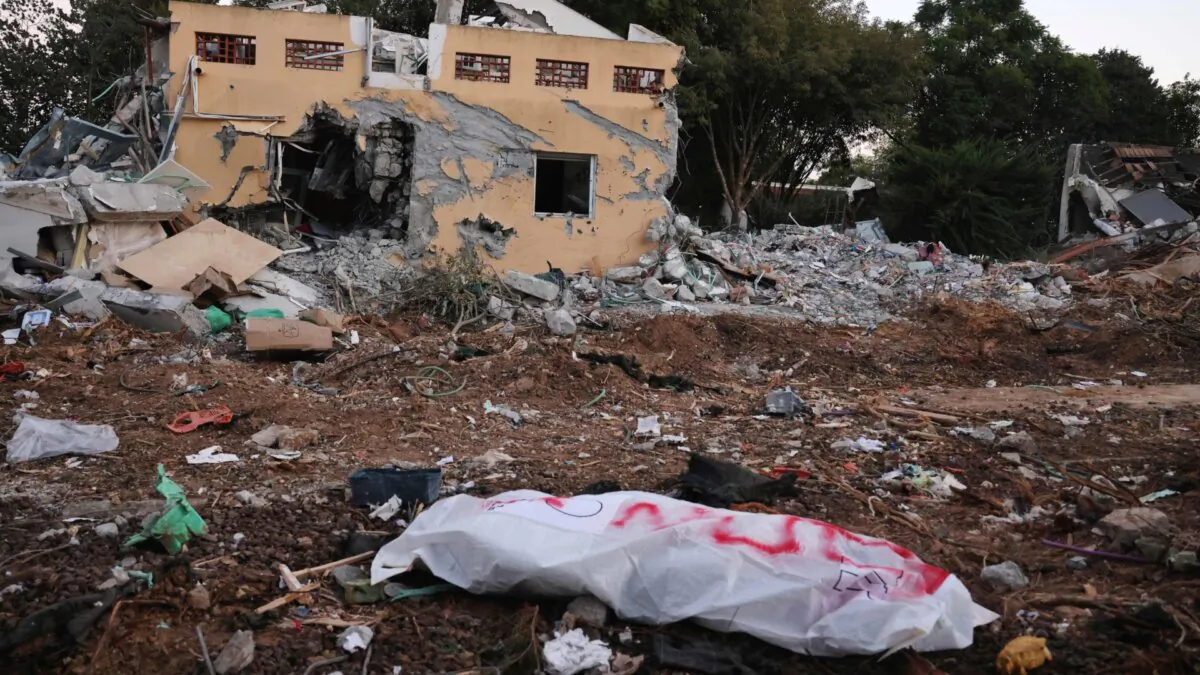 A covered body on Oct. 11, 2023, near the Israel-Gaza border where Hamas terrorists infiltrated Israel on Oct. 7, 2023. (Menahem Kahana/AFP via Getty Images)