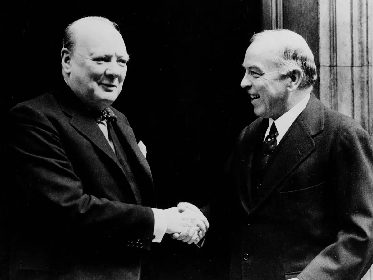 British Prime Minister Winston Churchill welcomes Canadian Prime Minister W.L. Mackenzie King on the occasion of Mr. King's visit to England in September 1941. (CP Photo)