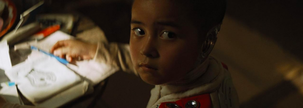 a small child in THE CREATOR