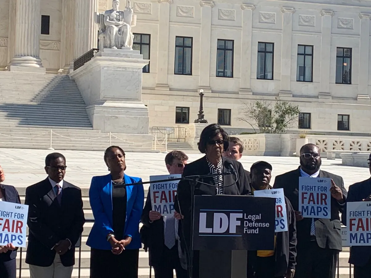 Brenda Murphy, president of the NAACP’s South Carolina State Conference, addresses a rally on Oct. 11, 2023, on the Supreme Court steps after the court heard a racial gerrymandering case. (Sam Dorman, The Epoch Times)
