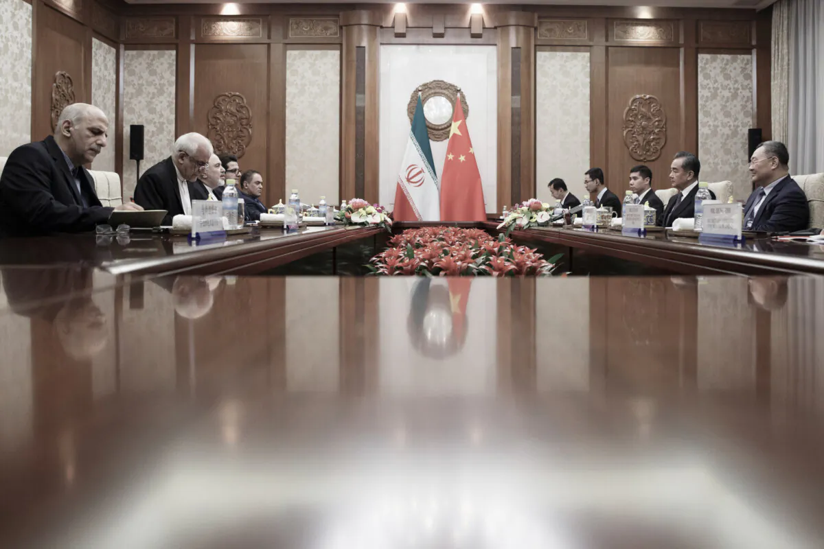 Iran's Foreign Minister Mohammad Javad Zarif (3rd L) meets China's Foreign Minister Wang Yi (2nd R) at the Diaoyutai State Guesthouse in Beijing on May 17, 2019. (THOMAS PETER/AFP via Getty Images)