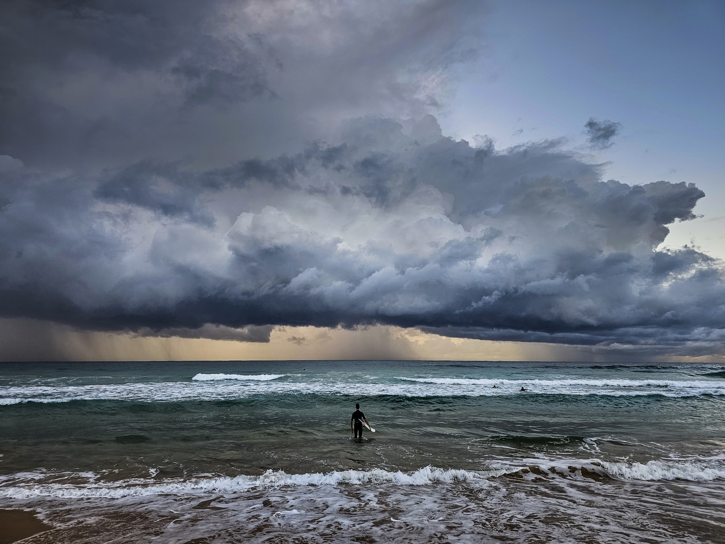 Braving the Storm by Les Irwig won winner of Standard Chartered Smartphone Weather Photographer of the Year.
