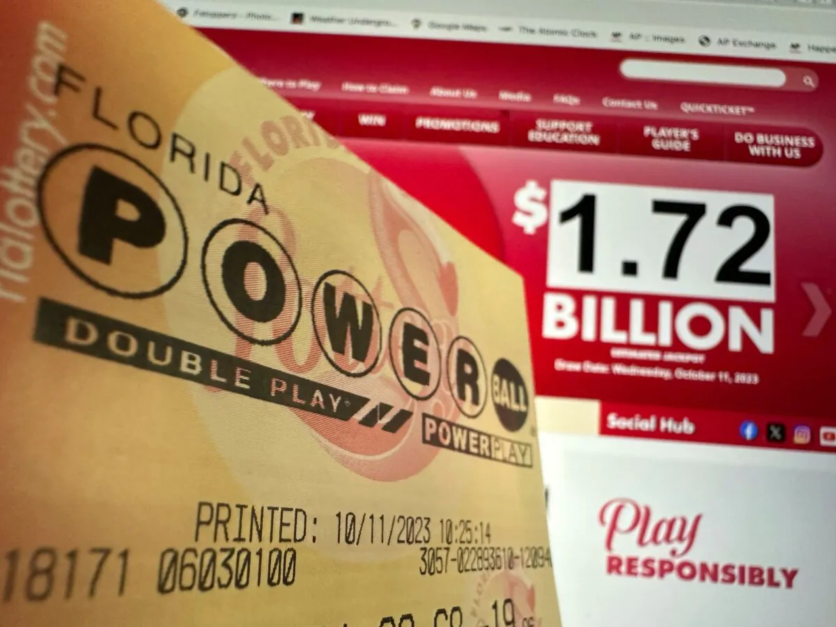 A Powerball lottery ticket is shown, in Surfside, Fla., on Oct. 11, 2023. (Wilfredo Lee/AP Photo)