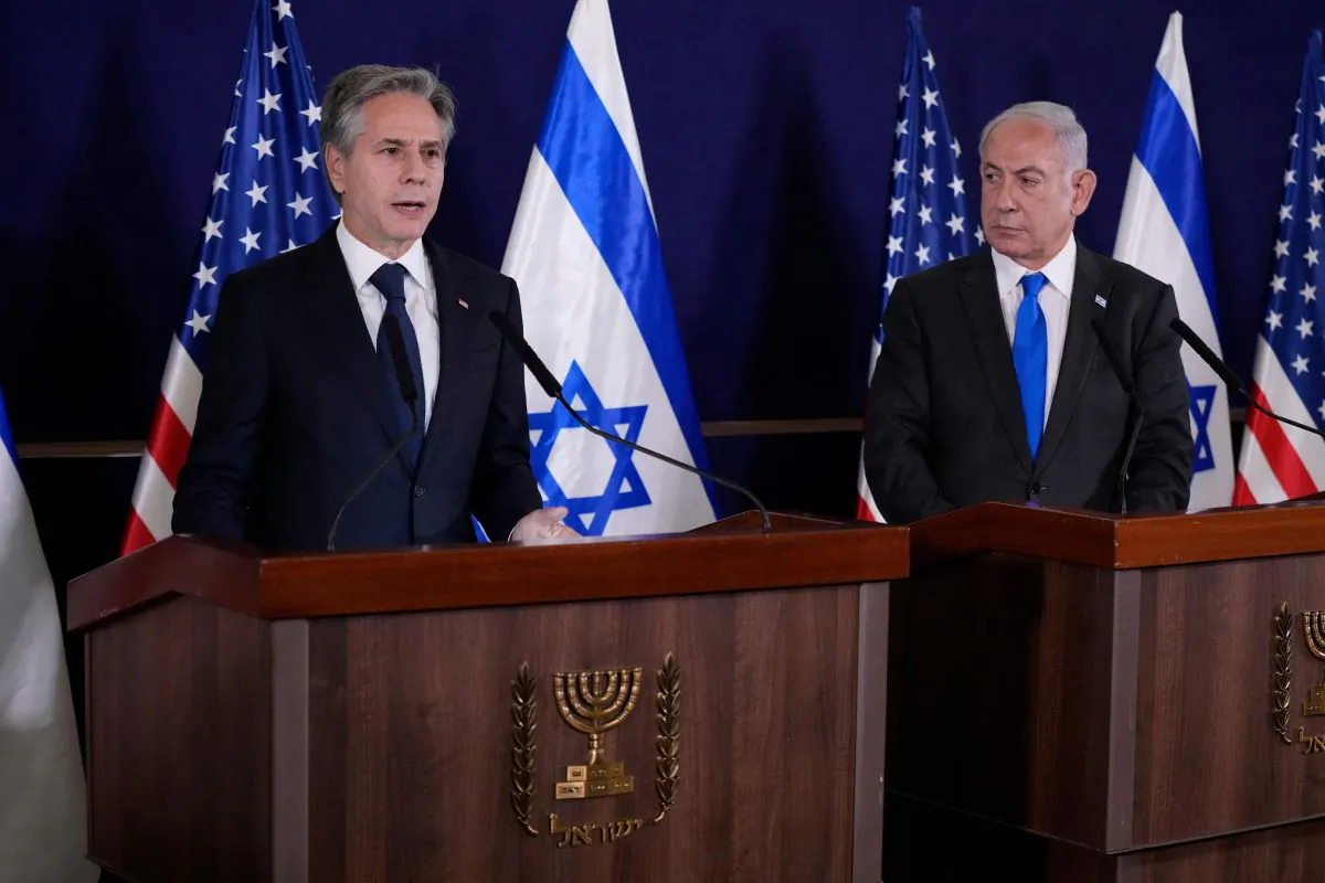 Israeli Prime Minister Benjamin Netanyahu (R) looks on as U.S. Secretary of State Antony Blinken gives statements to the media inside The Kirya, which houses the Israeli defense ministry, after their meeting in Tel Aviv, Israel, on Oct. 12, 2023. (Jacquelyn Martin/Pool/ AFP via Getty Images)