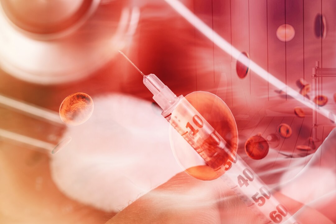 Health care diabetes control. Hand hold injection needle and red bloods background. Blood glucose.