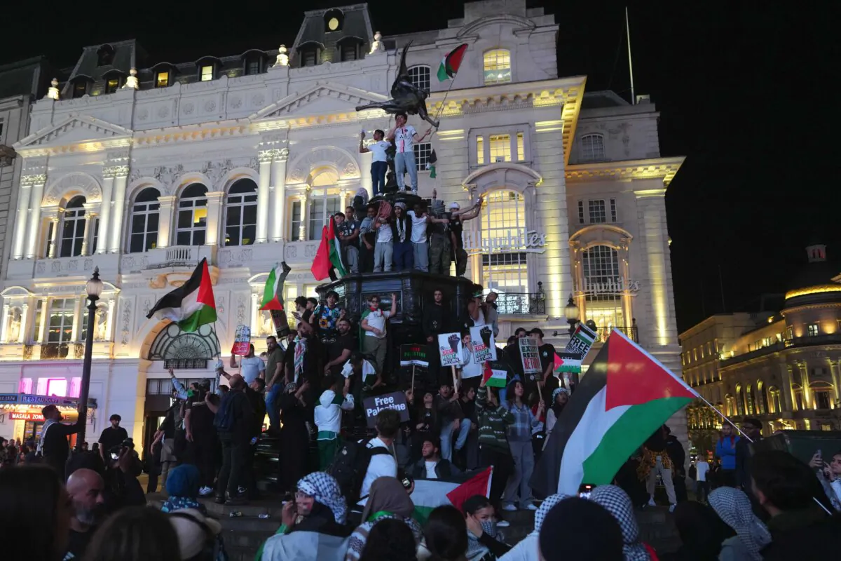 People take part in a demonstration in support of Palestine at Piccadilly Circus in London on Oct. 9, 2023. (Carl Court/Getty Images)
